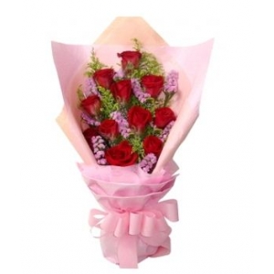 12 red roses bouquet with greenery