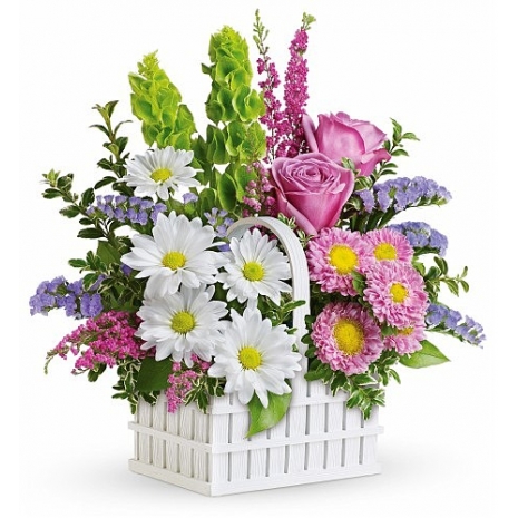 mix flowers in white basket
