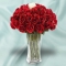24 Red Roses and 1 White Rose in Vase
